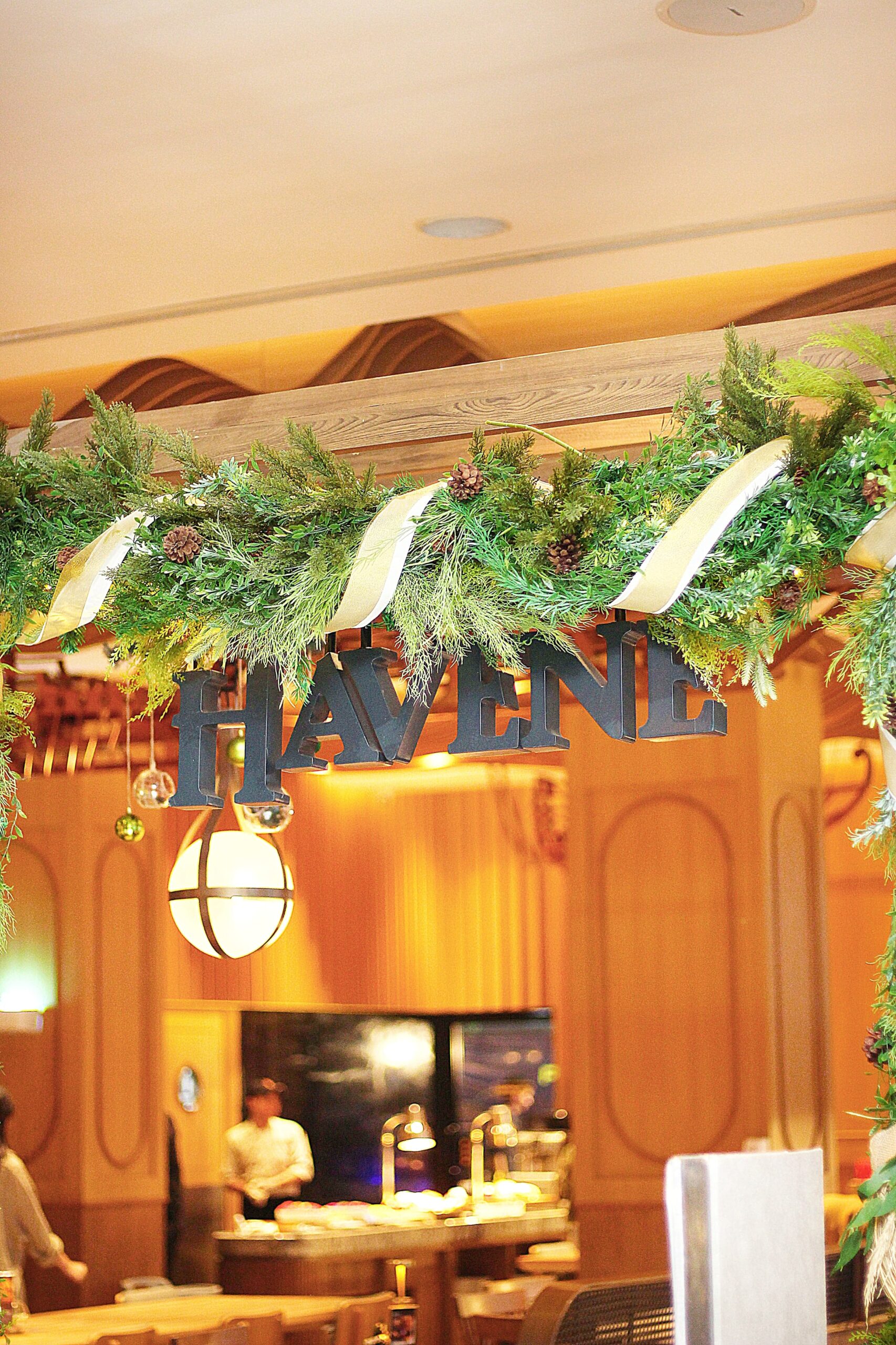 a decorated arch with a sign in natal dan tahun baru